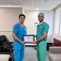 Dr. Diper Ariwala receiving a certificate